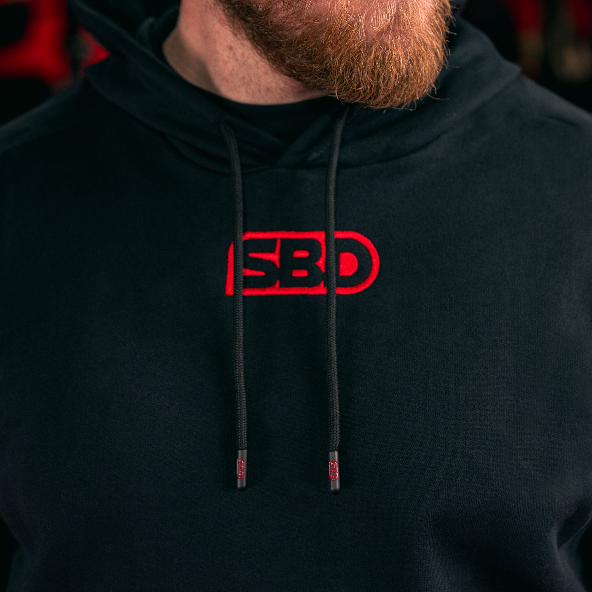 SBD Hoodie Schwarz Unisex Details Bändel und Logo Brust